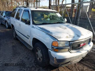 2005 GMC Yukon SLT with VIN 1GKEK13T55J203712, listed as a IAAI auction lot 41365171 with 296,663 mi miles. Bid and sale history available at carsss.com. Image 1.