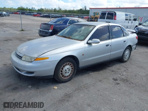 2002 Saturn LS z VIN 1G8JS54F92Y595651, wystawiony jako IAAI lot #41569902 z przebiegiem Nie podano mil oraz . Historia ofert i sprzedaży dostępna na DreamBid. Obrazek 2.