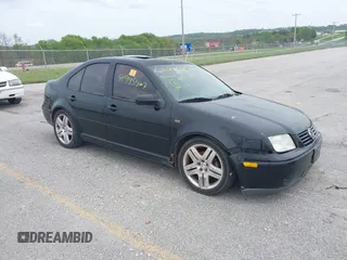 2002 Volkswagen Jetta z VIN 3VWTG69M22M042474, wystawiony jako IAAI lot #41995907 z przebiegiem Nie podano mil oraz . Historia ofert i sprzedaży dostępna na DreamBid. Obrazek 1.