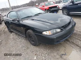 1997 Ford Mustang with VIN 1FALP4041VF129619, listed as a IAAI auction lot 41440766 with 135,934 mi miles. Bid and sale history available at carsss.com. Image 1.