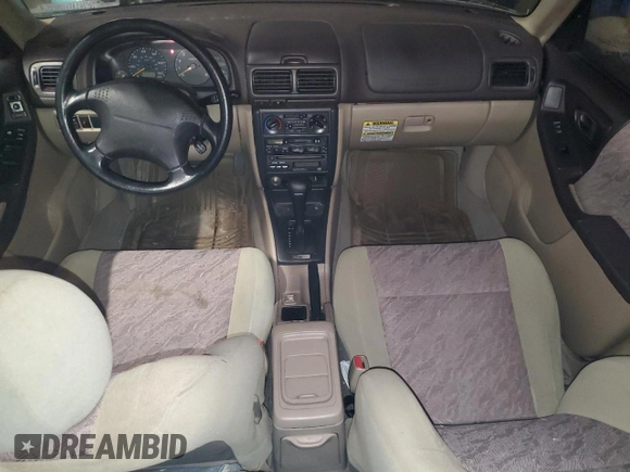 1999 Subaru Forester L with VIN JF1SF6351XH717087, listed as a Copart auction lot 85509274 with 59,695 mi miles and Salvage Title. Bid and sale history available at carsss.com. Image 8.