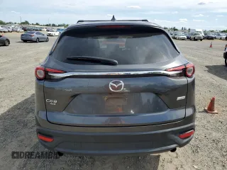 2019 Mazda CX-9 Touring with VIN JM3TCBCY0K0309947, listed as a Copart auction lot 56897815 with 87,517 mi miles and Salvage title. Bid and sale history available at DreamBid. Image 6.