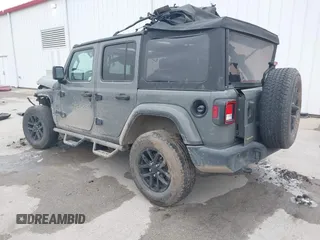 2023 Jeep Wrangler Willys with VIN 1C4HJXDN1PW596046, listed as a IAAI auction lot 41580875 with 48,451 mi miles and . Bid and sale history available at DreamBid. Image 3.