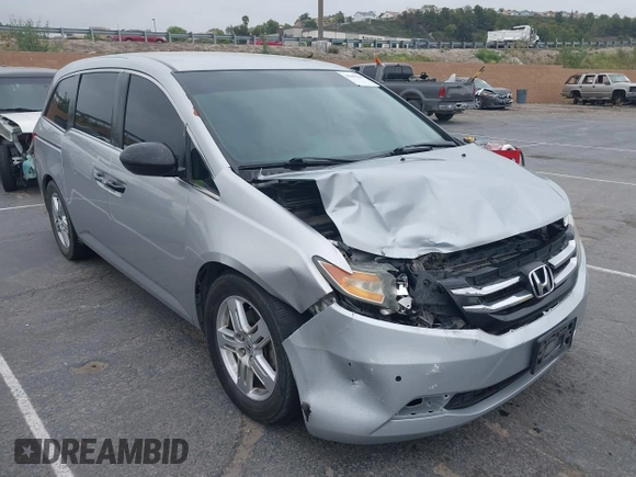 2014 Honda Odyssey LX z VIN 5FNRL5H28EB064426, wystawiony jako IAAI lot #42207634 z przebiegiem 169 706 mil mil oraz . Historia ofert i sprzedaży dostępna na DreamBid. Obrazek 1.