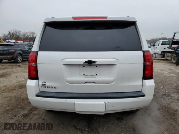 2017 Chevrolet Tahoe LT with VIN 1GNSKBKC7HR161997, listed as a Copart auction lot 44857395 with 142,345 mi miles and Salvage Title. Bid and sale history available at DreamBid. Image 6.