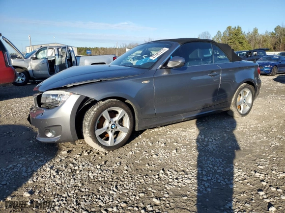 2012 BMW 1 Series 128i with VIN WBAUL7C58CVM82827, listed as a Copart auction lot 87487274 with 60,842 mi miles and Salvage Title. Bid and sale history available at carsss.com. Image 1.