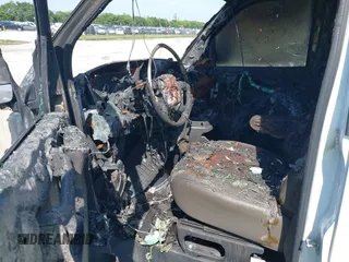 2021 Chevrolet Express Cargo with VIN 1GCWGBFP1M1267945, listed as a IAAI auction lot 38745449 with Not provided miles and . Bid and sale history available at DreamBid. Image 5.