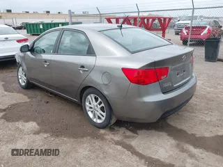 2012 Kia Forte EX with VIN KNAFU4A24C5632655, listed as a IAAI auction lot 41932379 with 146,273 mi miles. Bid and sale history available at carsss.com. Image 3.