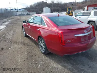 2013 Cadillac XTS with VIN 2G61N5S37D9177217, listed as a IAAI auction lot 41747566 with 140,946 mi miles. Bid and sale history available at carsss.com. Image 3.