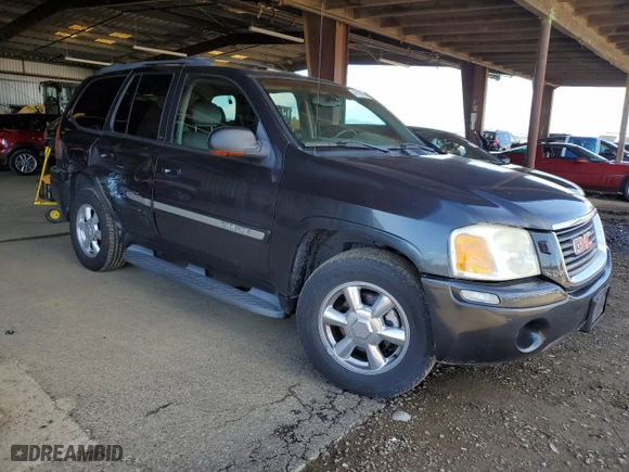 2003 GMC Envoy SLT with VIN 1GKDS13S532314786, listed as a Copart auction lot 49187965 with 186,821 mi miles and Salvage Title. Bid and sale history available at carsss.com. Image 4.