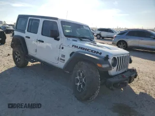 2022 Jeep Wrangler Unlimited Rubicon с VIN 1C4HJXFN3NW193177, выставлен на аукционе Copart как лот 82002224 с пробегом 34 762 миль миль и Списание • Salvage title. История ставок и продаж доступна на DreamBid. Изображение 4.