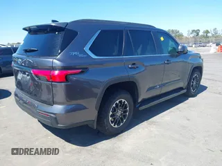 2024 Toyota Sequoia SR5 with VIN 7SVAAABA8RX047798, listed as a IAAI auction lot 41812410 with 7,411 mi miles. Bid and sale history available at carsss.com. Image 4.