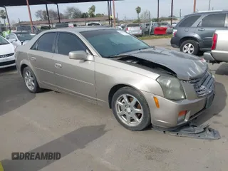 2003 Cadillac CTS with VIN 1G6DM57N730116792, listed as a IAAI auction lot 41686845 with 121,590 mi miles. Bid and sale history available at carsss.com. Image 1.