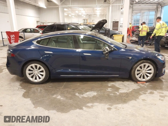 2018 Tesla Model S 75D with VIN 5YJSA1E24JF276044, listed as a IAAI auction lot 41798530 with 53,462 mi miles and . Bid and sale history available at DreamBid. Image 13.
