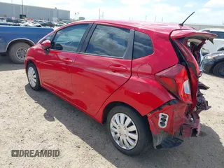 2015 Honda Fit LX with VIN 3HGGK5H55FM779294, listed as a IAAI auction lot 41771797 with 86,269 mi miles. Bid and sale history available at carsss.com. Image 3.