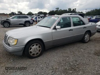 1994 Mercedes-Benz E Class with VIN WDBEA32E5RC105463, listed as a Copart auction lot 71737384 with 145,753 mi miles and Clean Title. Bid and sale history available at carsss.com. Image 1.