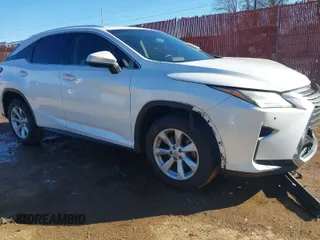 2016 Lexus RX 350 F Sport with VIN 2T2BZMCAXGC027034, listed as a IAAI auction lot 41357028 with 136,496 mi miles. Bid and sale history available at carsss.com. Image 1.