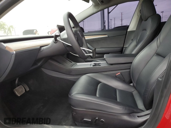2023 Tesla Model 3 z VIN 5YJ3E1EA7PF541421, wystawiony jako Copart lot #54513655 z przebiegiem 63 314 mil mil oraz Szkoda całkowita • Salvage title. Historia ofert i sprzedaży dostępna na DreamBid. Obrazek 7.