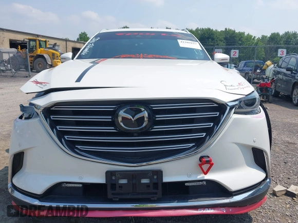 2020 Mazda CX-9 Grand Touring with VIN JM3TCBDY3L0410674, listed as a IAAI auction lot 42389157 with 130,519 mi miles and . Bid and sale history available at DreamBid. Image 12.