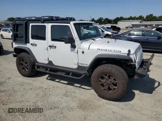 2014 Jeep Wrangler Unlimited Rubicon with VIN 1C4BJWFG0EL201559, listed as a Copart auction lot 59580575 with 182,101 mi miles and Salvage title. Bid and sale history available at DreamBid. Image 4.