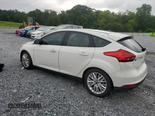 2016 Ford Focus Titanium with VIN 1FADP3N22GL292399, listed as a Copart auction lot 63033385 with 180,653 mi miles and Clean title. Bid and sale history available at DreamBid. Image 2.