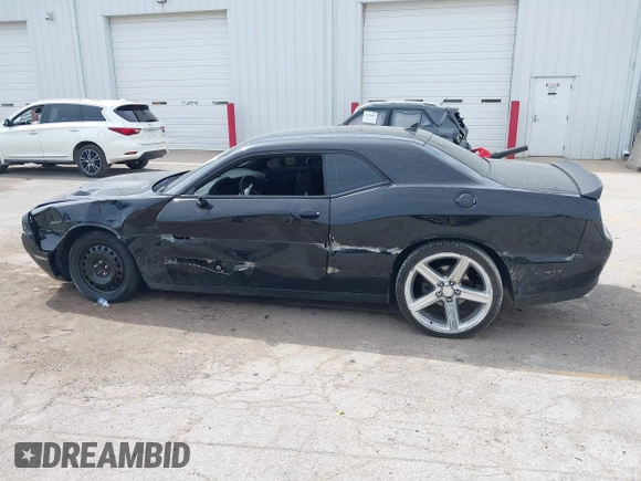 2016 Dodge Challenger R/T Plus with VIN 2C3CDZBT7GH177992, listed as a IAAI auction lot 42136475 with 132,808 mi miles and . Bid and sale history available at DreamBid. Image 14.