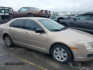 2006 Ford Fusion S with VIN 3FAFP06Z56R114621, listed as a IAAI auction lot 41901022 with 234,238 mi miles. Bid and sale history available at carsss.com. Image 14.