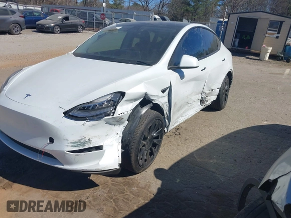2021 Tesla Model Y Long Range with VIN 5YJYGDEE8MF125104, listed as a IAAI auction lot 41698065 with 25,177 mi miles and . Bid and sale history available at DreamBid. Image 6.