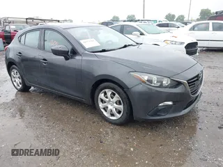 2015 Mazda 3 i Sport z VIN 3MZBM1K71FM217735, wystawiony jako IAAI lot #42371305 z przebiegiem 178 786 mil mil oraz . Historia ofert i sprzedaży dostępna na DreamBid. Obrazek 1.