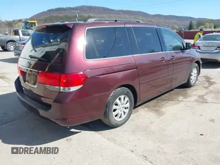 2009 Honda Odyssey EX-L with VIN 5FNRL38619B040594, listed as a IAAI auction lot 42037189 with 189,677 mi miles. Bid and sale history available at carsss.com. Image 4.