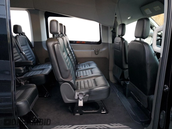 2023 Ford Transit with VIN 1FBVU4X8XPKB63870, listed as a Copart auction lot 82731504 with 7,576 mi miles and Salvage Title. Bid and sale history available at DreamBid. Image 11.