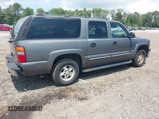 2002 Chevrolet Suburban LT z VIN 1GNFK16Z52J310536, wystawiony jako IAAI lot #42681583 z przebiegiem 197 076 mil mil oraz . Historia ofert i sprzedaży dostępna na DreamBid. Obrazek 4.