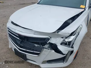 2019 Cadillac CTS RWD with VIN 1G6AP5SX0K0121219, listed as a IAAI auction lot 41239899 with 84,588 mi miles and . Bid and sale history available at DreamBid. Image 6.