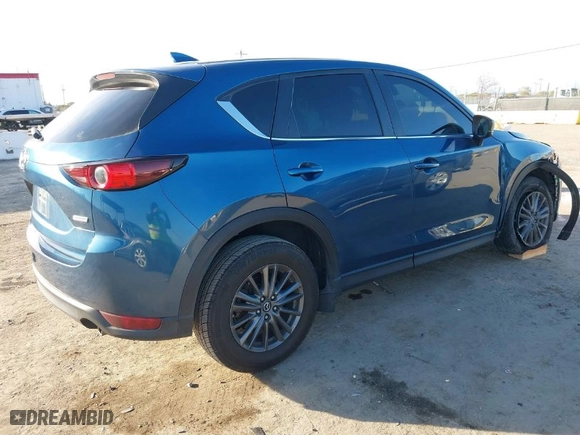 2019 Mazda CX-5 Touring with VIN JM3KFACM1K0517958, listed as a IAAI auction lot 41473681 with NaN miles. Bid and sale history available at carsss.com. Image 4.