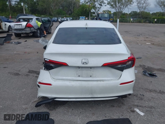 2022 Honda Civic Sport z VIN 2HGFE2F58NH560122, wystawiony jako IAAI lot #41193826 z przebiegiem 50 005 mil mil oraz . Historia ofert i sprzedaży dostępna na DreamBid. Obrazek 16.