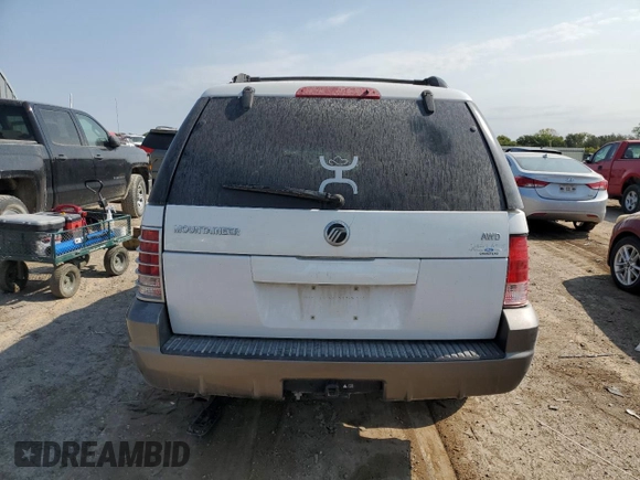 2002 Mercury Mountaineer z VIN 4M2ZU86E32ZJ27444, wystawiony jako Copart lot #75109744 z przebiegiem 194 298 mil mil oraz Szkody całkowita. Historia ofert i sprzedaży dostępna na DreamBid. Obrazek 6.