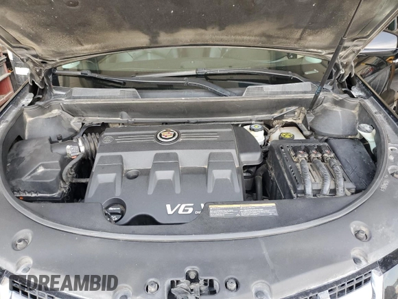 2015 Cadillac SRX Performance Collection with VIN 3GYFNCE34FS631491, listed as a Copart auction lot 64109575 with 102,763 mi miles and Salvage title. Bid and sale history available at DreamBid. Image 12.
