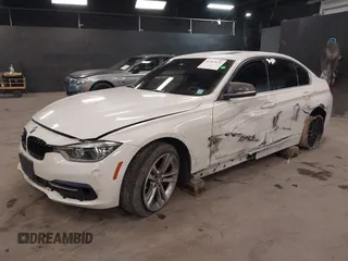 2018 BMW 3 Series 330i xDrive with VIN WBA8D9G56JNU72833, listed as a IAAI auction lot 41287671 with 93,529 mi miles. Bid and sale history available at carsss.com. Image 2.