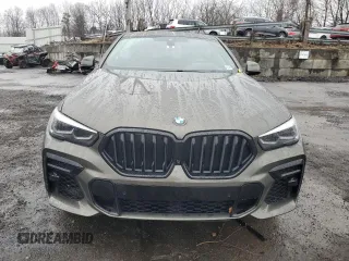 2023 BMW X6 xDrive40i z VIN 5UXCY6C03P9P48220, wystawiony jako Copart lot #51660845 z przebiegiem 24 947 mil mil oraz Szkoda całkowita • Salvage title. Historia ofert i sprzedaży dostępna na DreamBid. Obrazek 5.