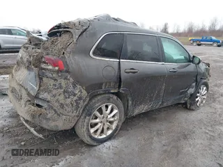 2015 Jeep Cherokee Limited with VIN 1C4PJMDSXFW688254, listed as a IAAI auction lot 41937322 with 107,935 mi miles. Bid and sale history available at carsss.com. Image 4.