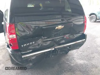 2009 Chevrolet Tahoe LTZ z VIN 1GNFK330X9R219064, wystawiony jako IAAI lot #42261154 z przebiegiem 125 511 mil mil oraz . Historia ofert i sprzedaży dostępna na DreamBid. Obrazek 6.