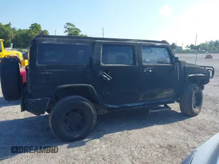 2003 Hummer H2 z VIN 5GRGN23UX3H140510, wystawiony jako IAAI lot #42325527 z przebiegiem 140 010 mil mil oraz . Historia ofert i sprzedaży dostępna na DreamBid. Obrazek 14.