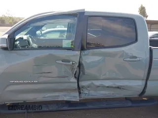 2022 Toyota Tacoma SR5 z VIN 3TMBZ5DN3NM034388, wystawiony jako IAAI lot #42270543 z przebiegiem 179 904 mil mil oraz . Historia ofert i sprzedaży dostępna na DreamBid. Obrazek 6.