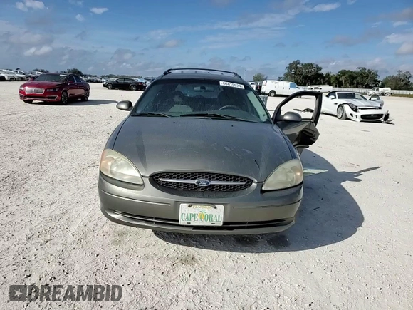 2003 Ford Taurus SE Standard with VIN 1FAFP58U33A259080, listed as a Copart auction lot 86819024 with 143,482 mi miles and Salvage Title. Bid and sale history available at carsss.com. Image 11.