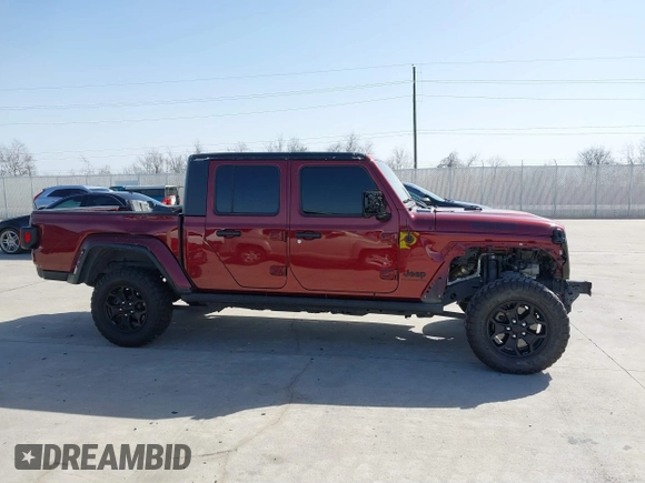2021 Jeep Gladiator Willys z VIN 1C6HJTAG0ML536455, wystawiony jako IAAI lot #41702393 z przebiegiem 90 644 mil mil oraz . Historia ofert i sprzedaży dostępna na DreamBid. Obrazek 13.
