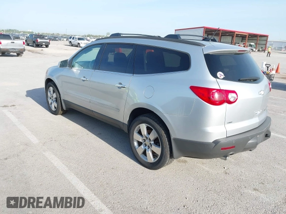 2011 Chevrolet Traverse LTZ with VIN 1GNKVLEDXBJ250325, listed as a IAAI auction lot 42107708 with 203,439 mi miles and . Bid and sale history available at DreamBid. Image 3.