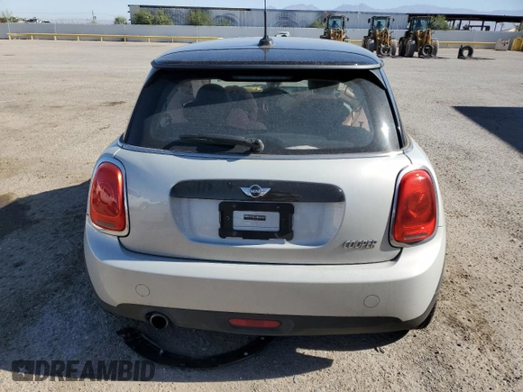 2017 MINI Hardtop Cooper with VIN WMWXP5C34H2F61072, listed as a Copart auction lot 57314695 with 46,693 mi miles and Salvage title. Bid and sale history available at DreamBid. Image 6.