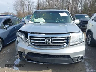 2014 Honda Pilot Touring with VIN 5FNYF4H9XEB038551, listed as a IAAI auction lot 41585720 with 150,725 mi miles and . Bid and sale history available at carsss.com. Image 12.