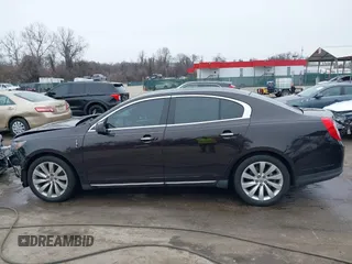 2014 Lincoln MKS with VIN 1LNHL9EK7EG609329, listed as a IAAI auction lot 41555819 with 89,849 mi miles. Bid and sale history available at carsss.com. Image 14.