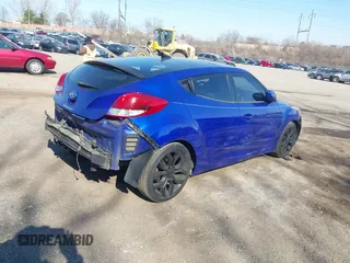 2012 Hyundai Veloster w/Black Int z VIN KMHTC6AD9CU046041, wystawiony jako IAAI lot #41772806 z przebiegiem 110 098 mil mil oraz . Historia ofert i sprzedaży dostępna na DreamBid. Obrazek 4.